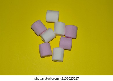 Colorfull Marshmellow Top View With Yellow Background, Sweet Sugar Pink White