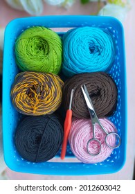 Colorfull Yarn In The Basket With Siccors And Needle Crochet