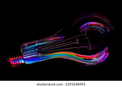 A colorfully illuminated light bulb - Powered by Shutterstock