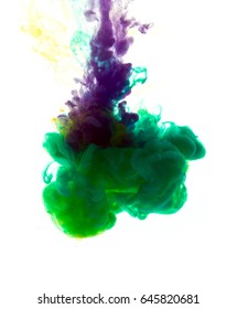 Colors dropped into liquid and photographed while in motion. Cloud of silky ink in water on white isolated background, an abstract banner. - Shutterstock ID 645820681