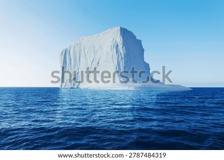 colossal massive tabular iceberg floating in a ocean under a clear blue sky. Large iceberg floating in open deep blue waters,  the effects of climate change and ice shelf retreat. Global warming