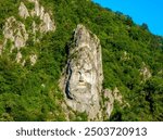 Colossal rock carving of King Decebalus  (AD 87–106) on the shores of the Danube river, Romania. The last king of Dacia, who fought against the Roman emperors Domitian and Trajan