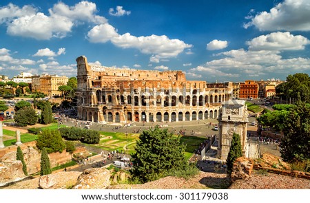 Colosseum (Coliseum), Rome, Italy, Europe. It is top travel attraction of Rome. Skyline of Rome, panoramic scenic view of Colosseum and sky. Panorama of Ancient Roman ruins, landscape of old Rome city