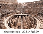 Colosseum or Coliseum in Rome, Italy. The iconic ancient Roman monument, world landmark. Color, Sunrise, Black and white, Brown hues.