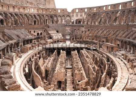Colosseum or Coliseum in Rome, Italy. The iconic ancient Roman monument, world landmark. Color, Sunrise, Black and white, Brown hues.