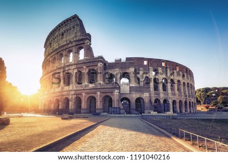 Colosseum in Rome, Italy at sunrise. Colourful travel background.  
