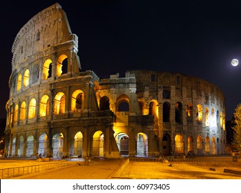 The Colosseum, The World Famous Landmark In Rome.  Night View .Panorama