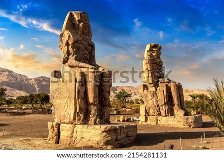 Colossi of Memnon in Luxor, Valley of Kings, Egypt in a sunny day