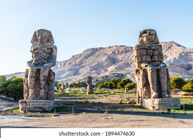 The Colossi Of Memnon, Two Massive Stone Statues Of The Pharaoh Amenhotep III, Who Reigned In Egypt During The Eighteenth Dynasty. Luxor, Egypt. 