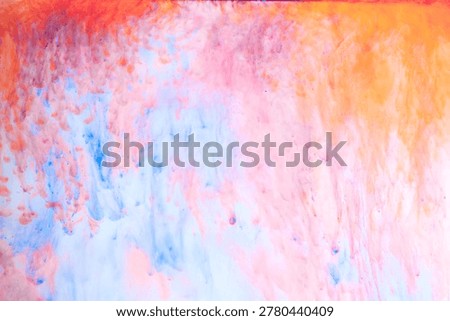Colouful Ink Texture Background with Copy Space in red, orange, 