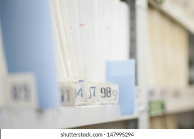 Colour Coded Filing System On Library Shelves