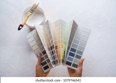 The Colour Of The Enamel In His Hands. The Choice Of Paint Color For The Walls.