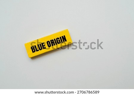 A coloured block with text BLUE ORIGIN