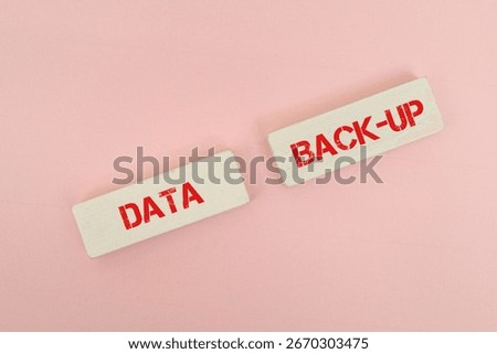 A coloured block with text DATA BACK-UP