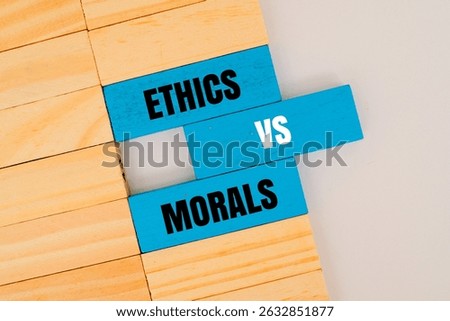 A coloured block with text ETHICS VS MORALS