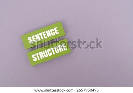 A coloured block with text SENTENCE STRUCTURE