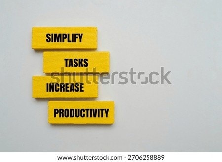 A coloured block with text SIMPLIFY TASKS INCREASE PRODUCTIVITY