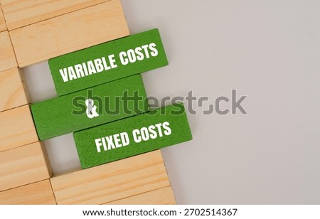 A coloured block with text VARIABLE COSTS AND FIXED COSTS