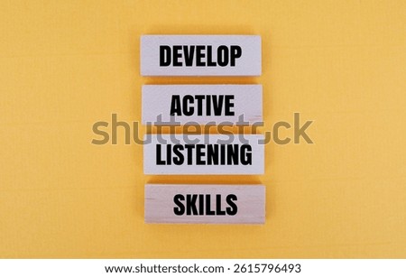 A coloured block with word DEVELOP ACTIVE LISTENING SKILLS