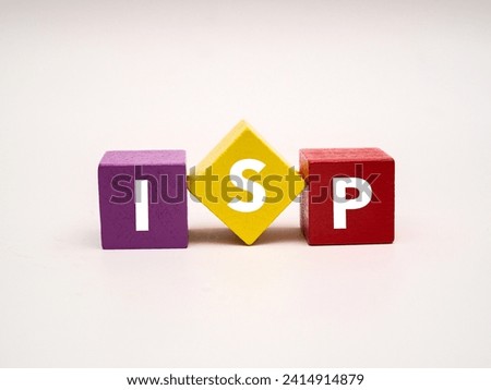 A coloured wooden block with word “ISP” on it. ISP stands for 