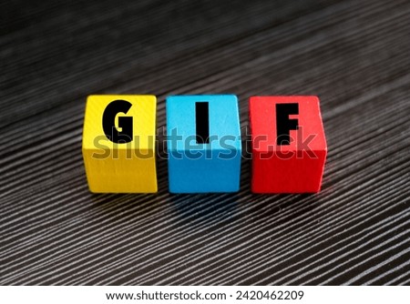 A coloured wooden block with word “GIF” on it. GIF stands for Graphics Interchange Format”