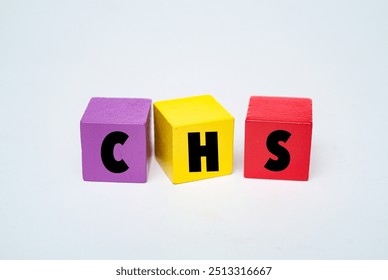 A coloured wooden cubes with text CHS on it. CHS stands for Chediak Higashi Syndrome - Powered by Shutterstock