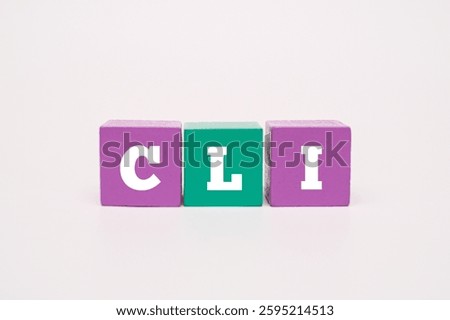 A coloured wooden cubes with text CLI. CLI stands for Command Line Interface