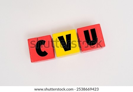 A coloured wooden cubes with text CVU on it. CVU stands for Cerebrovascular Ulcer