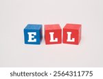 A coloured wooden cubes with text ELL. ELL stands for English Language Learners