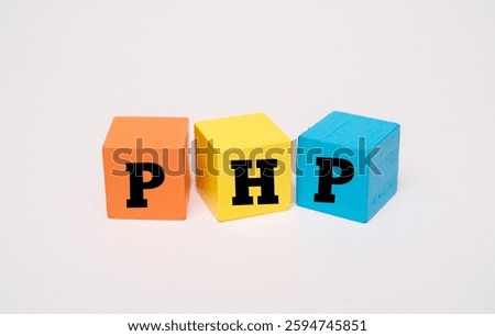 A coloured wooden cubes with text PHP. PHP stands for Hypertext Preprocessor
