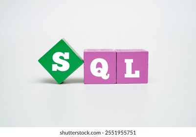 A coloured wooden cubes with text SQL. SQL stands for Structured Query Language - Powered by Shutterstock - Get 15% off with code: PIKWIZARD15