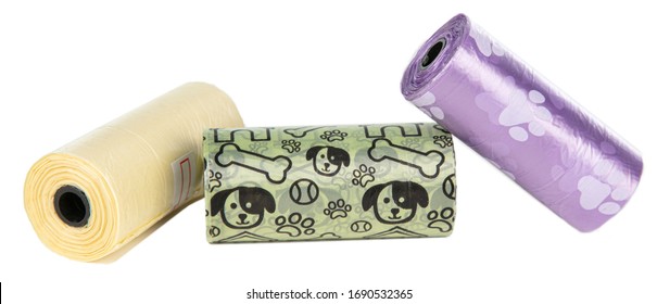 colourful bag rolls for collecting dog excrement on white background