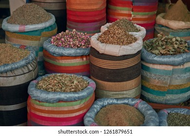 Colourful bags with herbs and spices on a market in Marrakech, Medina.                          