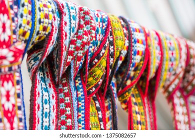 Colourful Baltic ethnic textile belts in open air market - Shutterstock ID 1375082657