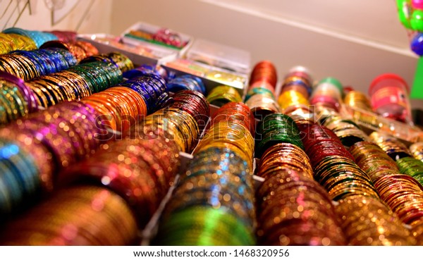 Colourful bangles from a shop in Chennai,India.\
These bangles are made of Glass used as beauty accessories by\
Indian women