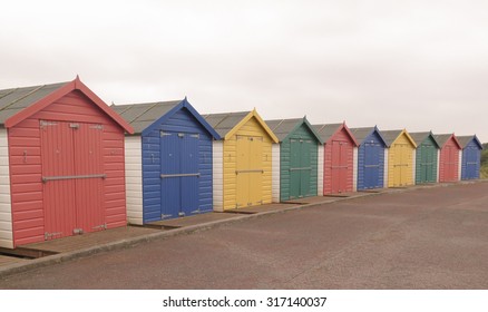 Colourful Beach Huts in the Seaside Resort of Dawlish Sands on the Coast of Devon, England, UK - Powered by Shutterstock