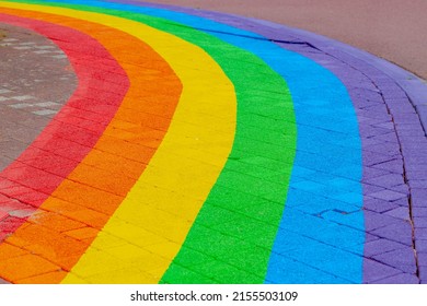 Colourful bricks footpath, Multicolor painted on outdoor path, Rainbow coloured on street, Symbol of gay, Lesbian, Bisexual and transgender, LGBT social movements, Abstract texture pattern background.