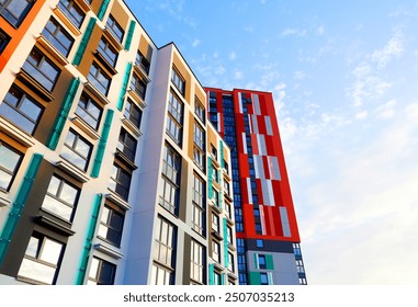 Colourful Building exterior. New house, home complex. Colored Facade building background. Modern building, houses with glass windows. New Buildings architecture. Residential apartment. Condominium. - Powered by Shutterstock