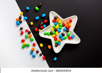 colourful  candies on black and white background	
