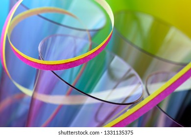 Colourful Closeup Of Champange Glasses And Serpentines