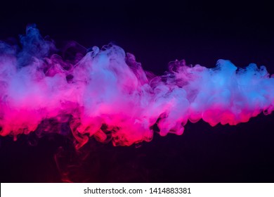 Colourful cloud of vapor. dark black background. nobody - Shutterstock ID 1414883381