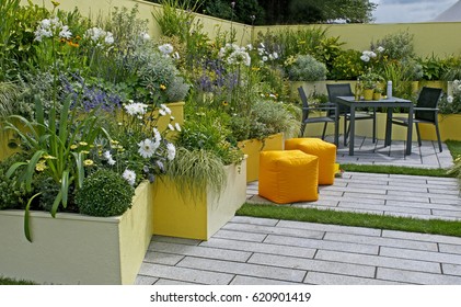 A Colourful Courtyard Garden Used As An Office Recreation Space