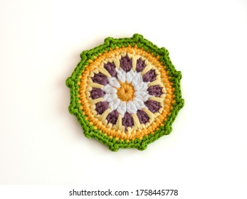 Colourful Crocheted Mandala On White Background. 