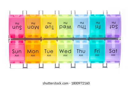 Colourful Daily Pill Dispenser Box On A White Background