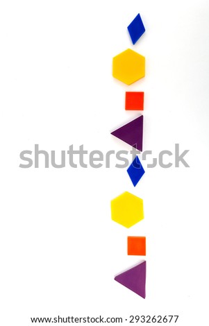 Colourful deci pattern blocks in geometric shapes to demonstrate patterns and repetition for fun math learning