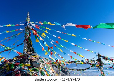 The colourful flags at mountain summit
