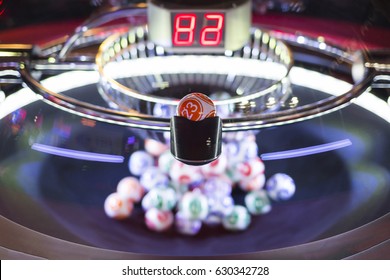 Colourful Lottery Balls In A Rotating Bingo Machine. Number 23.