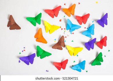 Colourful Origami Butterfly Paper On Withe Background.