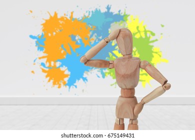 Colourful paint splashes against gray flooring and wall - Powered by Shutterstock
