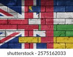 colourful painted big national flag of great britain and flag of central african republic on a massive old brick wall background. concept